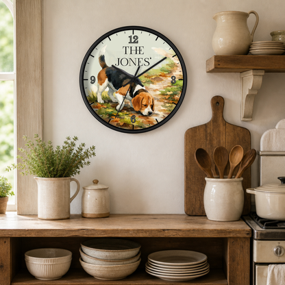 A round wall clock with a black frame hangs on a beige kitchen wall above a wooden counter. The clock face features a painted beagle dog on a path with the text 'THE JONES' at the top.