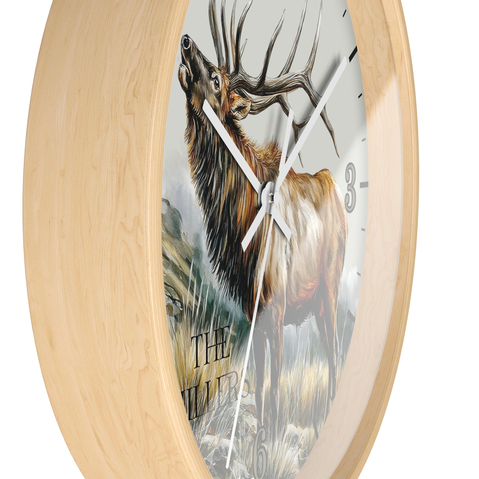 Round wall clock with a light natural wood frame and a printed deer illustration on the face, shown against a plain white background.