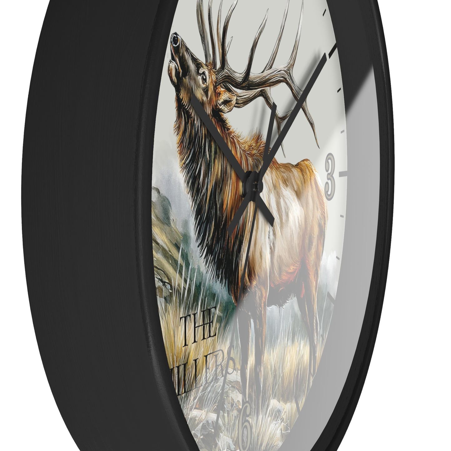 Round wall clock with a black frame and a printed illustration of a large deer with antlers on the face, shown against a plain white background.