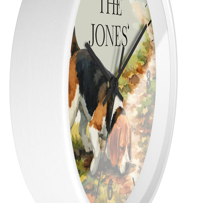 Round wall clock with a white frame and a printed illustration of a beagle dog on the face, with the text 'THE JONES' at the top.