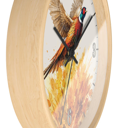 A round wall clock with a light natural wood frame and a printed pheasant bird artwork on the face, shown against a plain white background.