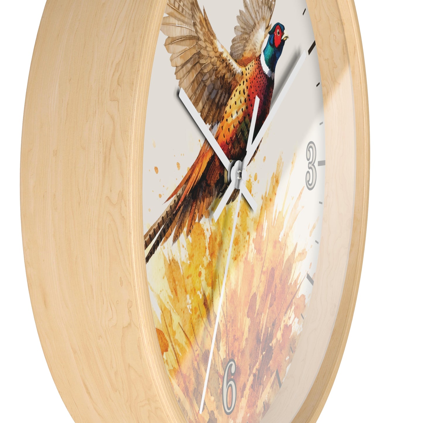 A round wall clock with a light natural wood frame and a printed pheasant artwork on the face. The clock has white hands, black hour markers, and numerals 3, 6, and 9 in a gray font, shown against a plain white background.