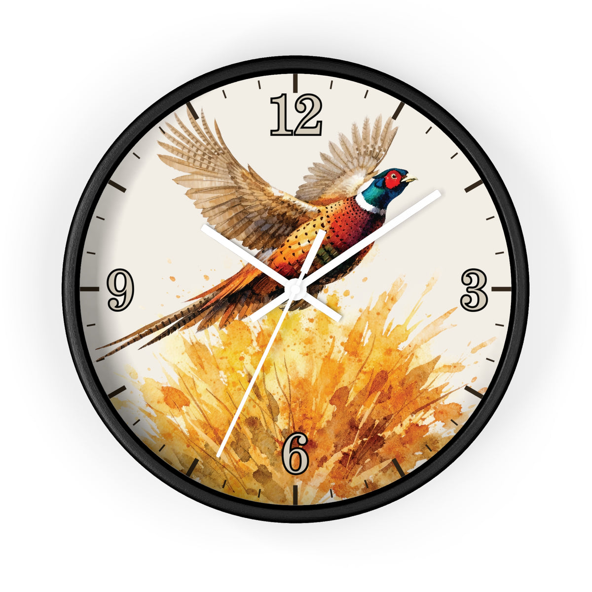 A round wall clock with a black frame and a printed bird illustration on the face. The artwork shows a pheasant in flight over a warm orange and yellow watercolor background, with black Arabic numerals and white clock hands.