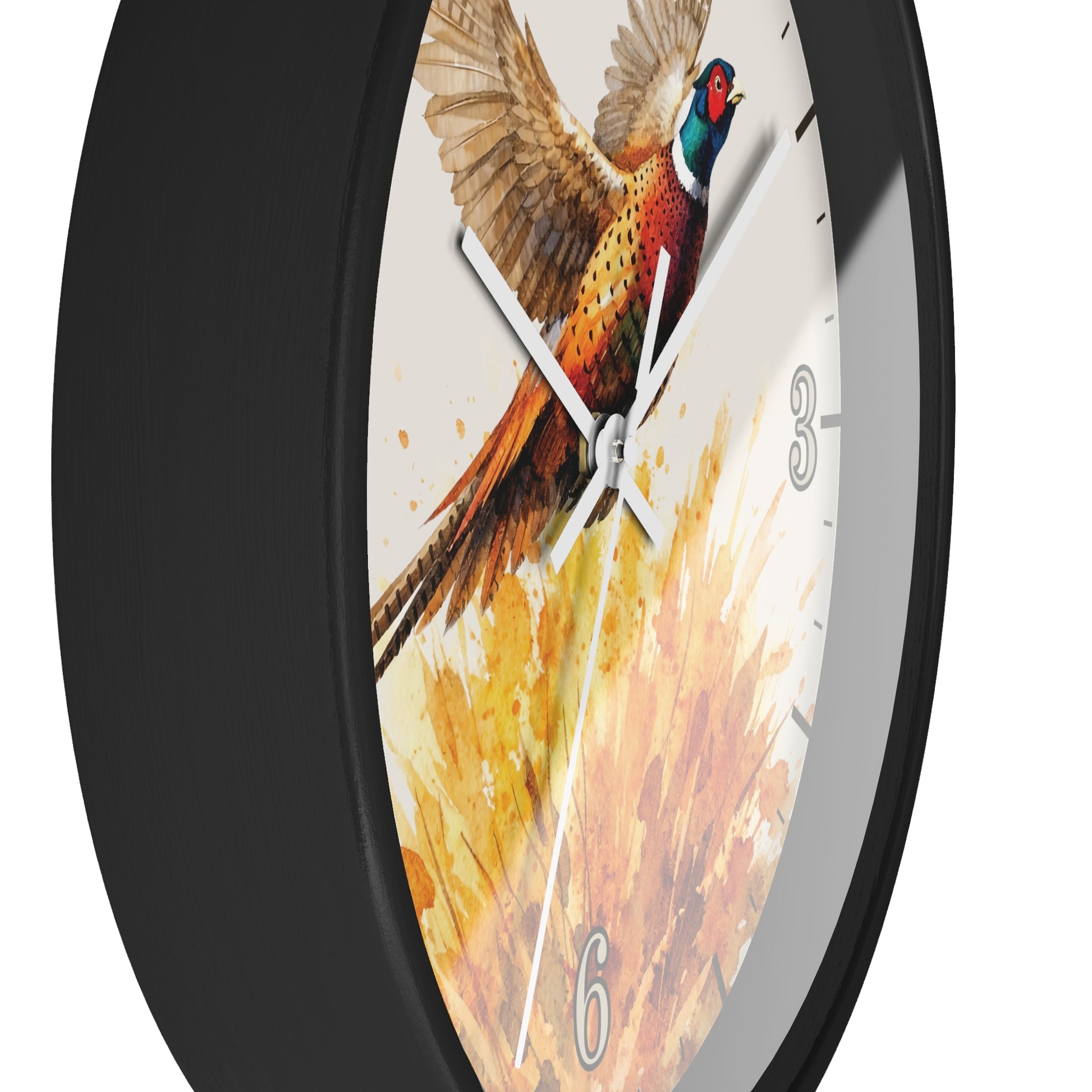 A round wall clock with a black frame and a printed watercolor-style pheasant bird design on the face, shown against a plain white background.