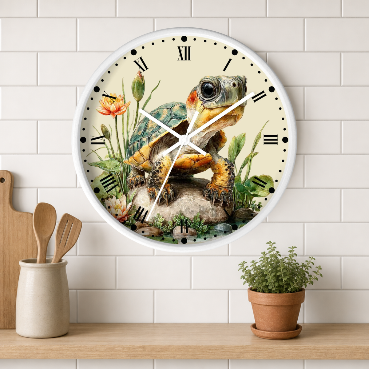 A round wall clock with a white frame and a detailed illustration of a turtle on the face, mounted on a white subway tile wall above a wooden shelf with kitchen utensils and a potted plant.