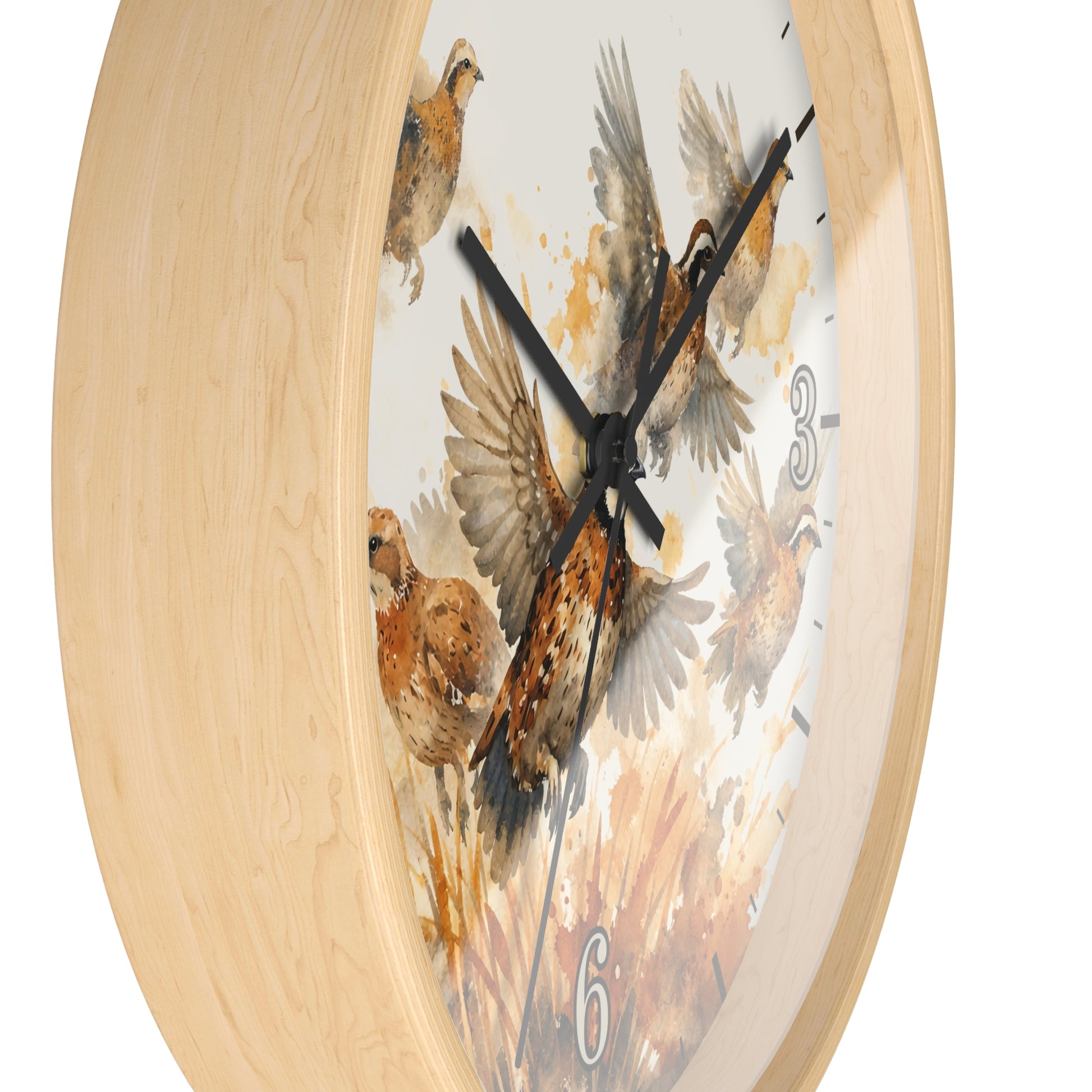 A close-up of a round wall clock with a light natural wood frame and a printed dial featuring watercolor-style birds in brown, beige, and gray tones on a white background.