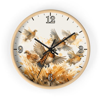 Round wall clock with a light natural wood frame and a watercolor-style bird print on the dial. The face shows several brown, beige, and gray birds in flight over a warm tan and cream background, with black numerals and hands.
