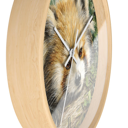 Round wall clock with a light natural wood frame and a printed red panda face design on the face, with white clock hands and a thin second hand.