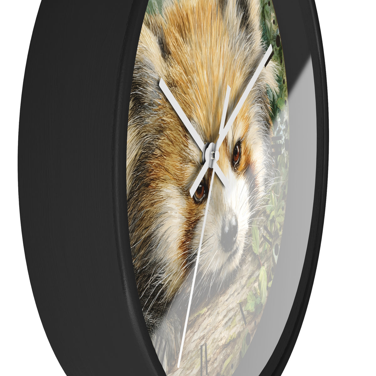 A round wall clock with a black frame and a printed fox face design on the face, shown against a plain white background.