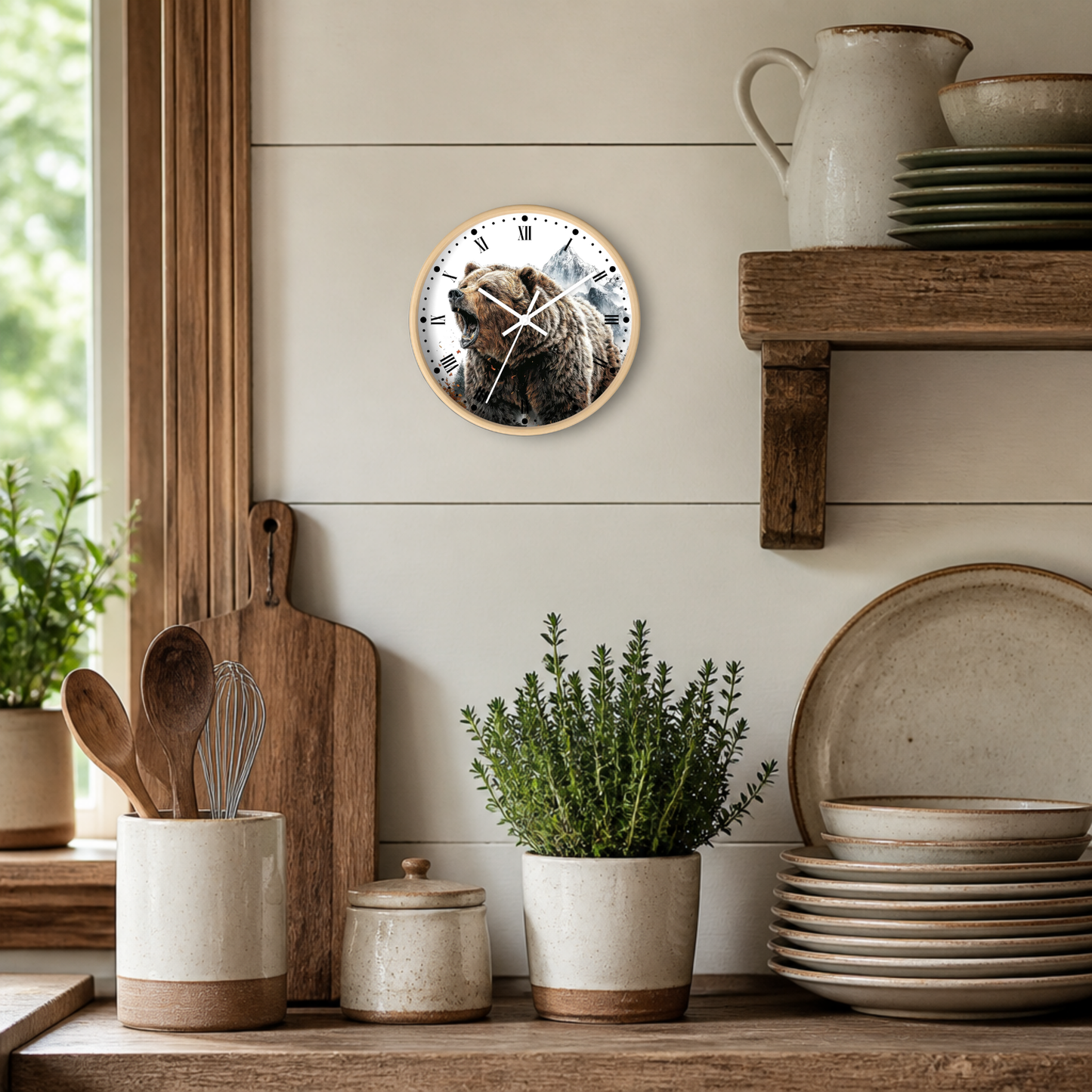 A round wall clock with a rustic wood frame and a printed bear face in the center, mounted on a beige shiplap wall in a styled kitchen setting with wooden shelves, ceramic dishes, and potted plants.