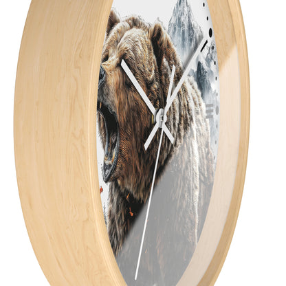 Round wall clock with a light natural wood frame and a printed design of a roaring brown bear in front of snowy mountains, shown on a white background.