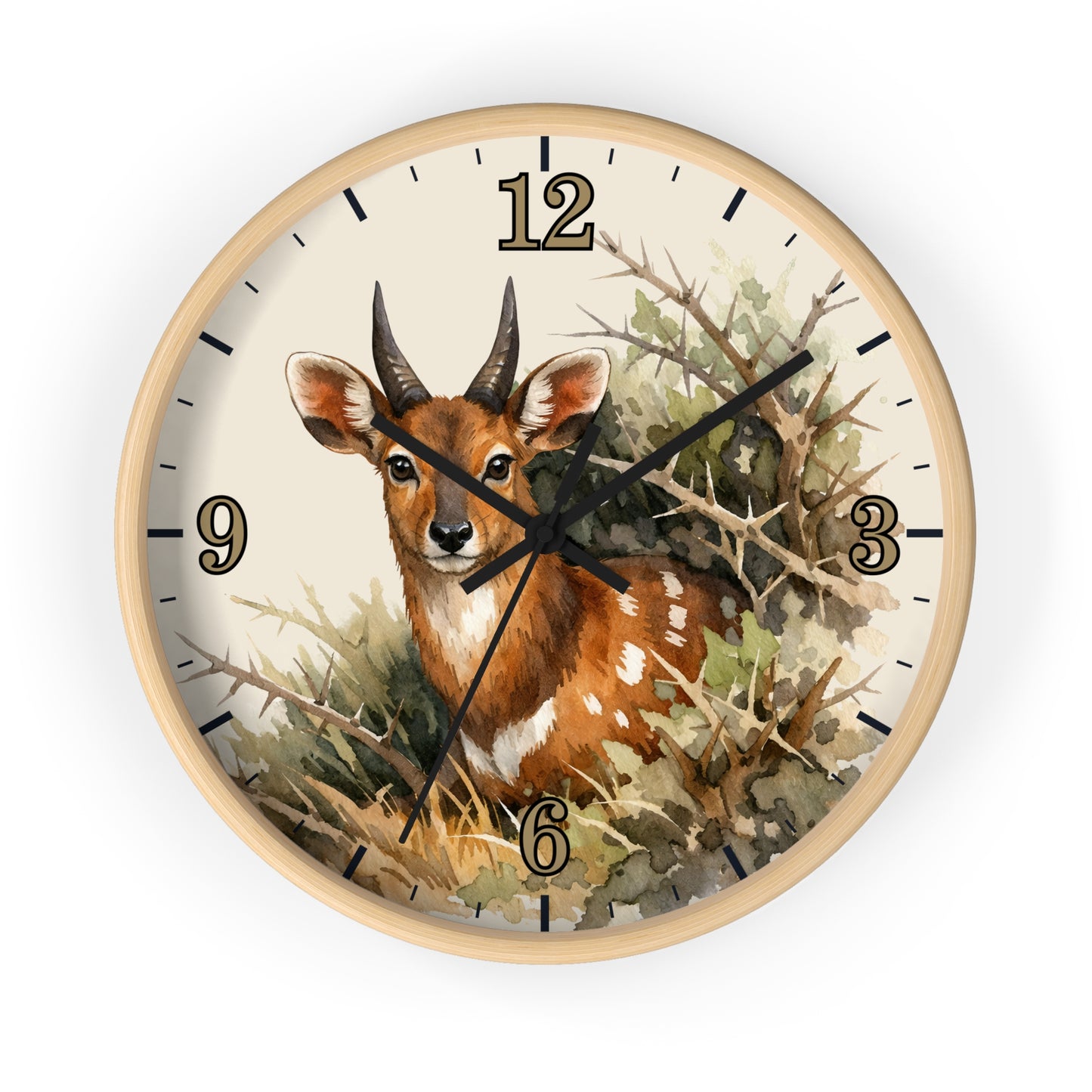 Round wall clock with a light wood frame and a watercolor-style illustration of a deer among branches on the clock face, with black numerals and hands on a white background.