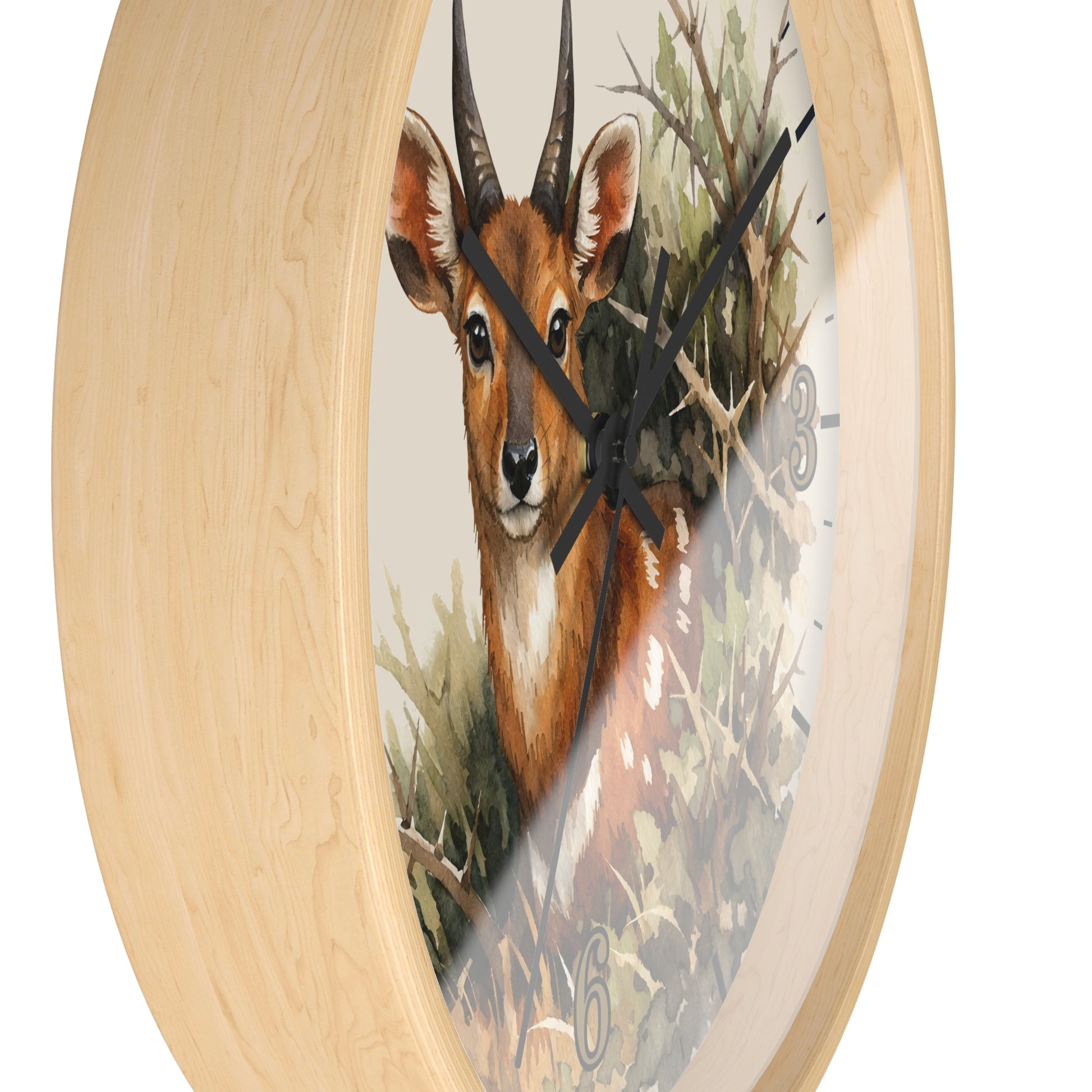 Round wall clock with a light natural wood frame and a detailed illustration of a brown antelope gazelle in a forest scene on the clock face.