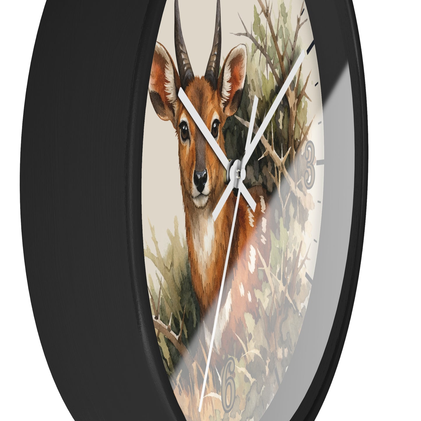 A round wall clock with a black frame and a printed deer illustration on the face, photographed against a plain white background.