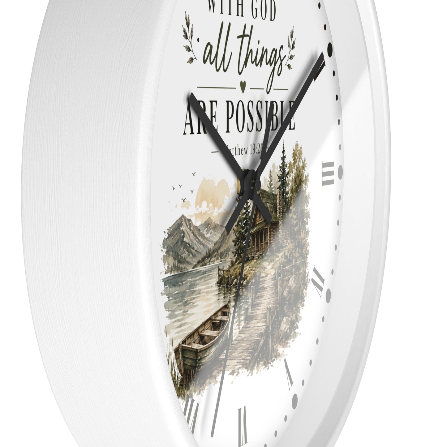 White round wall clock with a scenic mountain lake illustration and the quote 'WITH GOD all things ARE POSSIBLE' on the face, shown against a plain white background.
