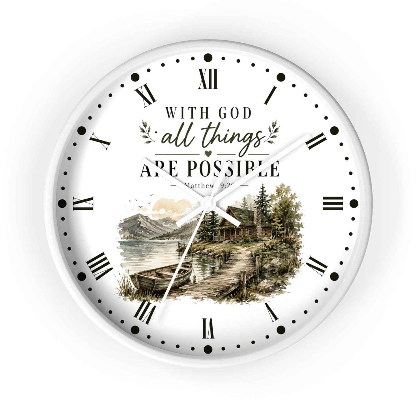 A round white wall clock with black Roman numerals and hands, featuring the inspirational quote 'WITH GOD all things ARE POSSIBLE Matthew 19:26' above a scenic illustration of a lakeside cabin and mountains.