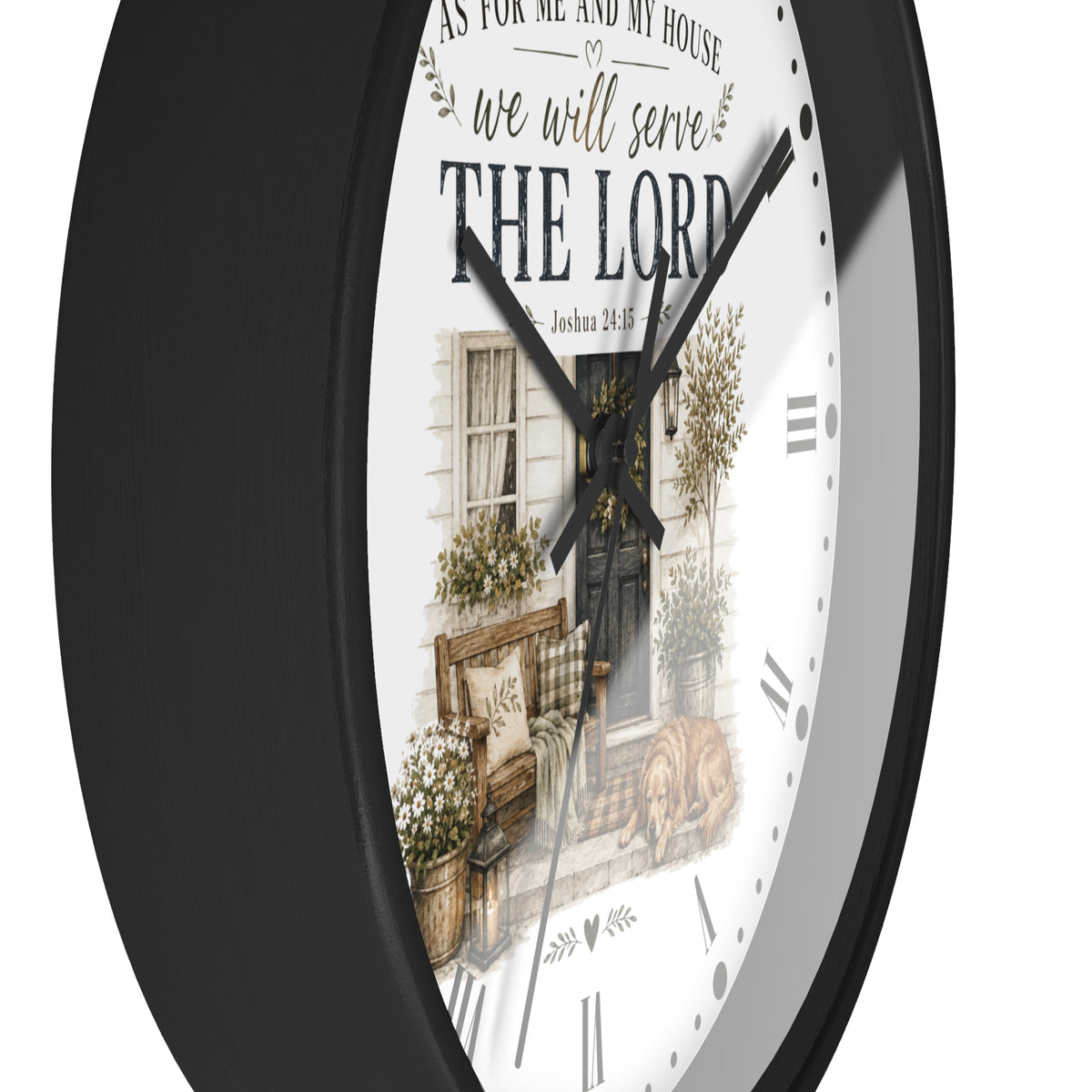 A round wall clock with a black frame and a white face featuring a rustic illustration of a front porch and the text 'AS FOR ME AND MY HOUSE we will serve THE LORD'.