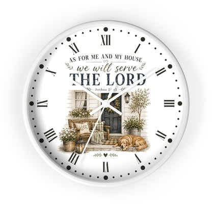 A round white wall clock with black Roman numerals and hands, featuring a printed illustration of a porch with a dog and the text 'AS FOR ME AND MY HOUSE we will serve THE LORD Joshua 24:15'.