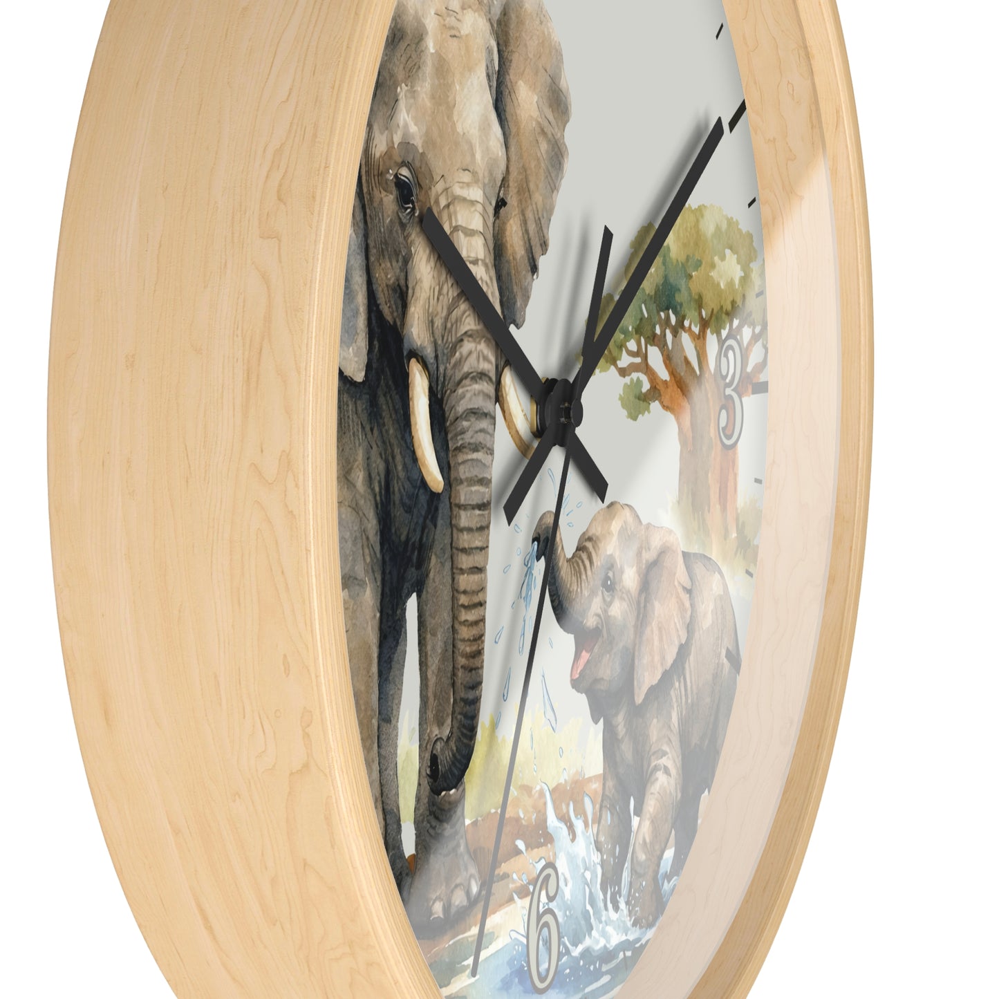 A round wall clock with a light natural wood frame and a printed elephant scene on the face, showing one large elephant and one smaller elephant near water, with black hands and no visible numbers except a small '6'.