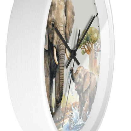 Oval wall clock with a white frame and a printed safari scene featuring two elephants, a tree, and water, shown against a plain white background.