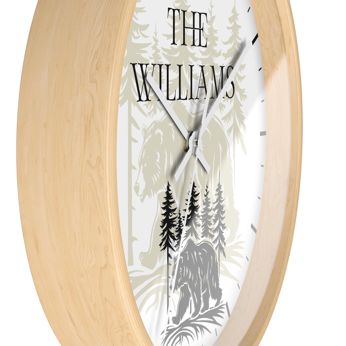 Personalized oval wall clock with a light natural wood frame and a white face featuring a forest illustration with a horse and bear, and the name 'THE WILLIAMS' in black text.