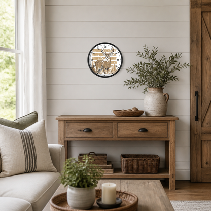 A round wall clock with a black frame and a rustic wood-and-stripe face hangs above a wooden console table in a styled living room. The scene includes a sofa, potted plants, baskets, and a vase with greenery.