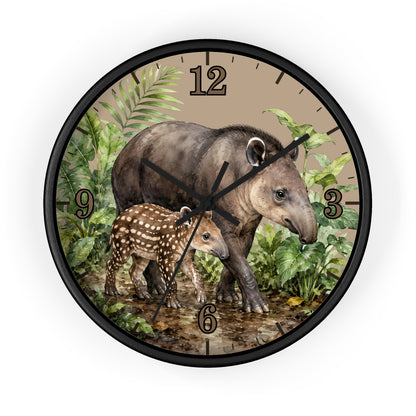 Round wall clock with a black frame and a tropical scene featuring a tapir and its foal among green leaves on a beige background, with black Arabic numerals.