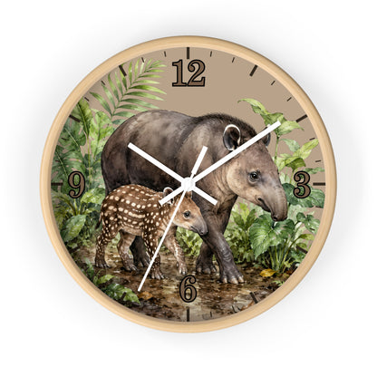 Round wall clock featuring a naturalistic illustration of a tapir and its foal among tropical foliage, with black Arabic numerals and white clock hands, shown on a clean white background.