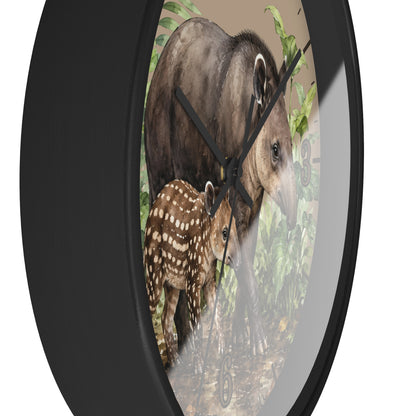 A round wall clock with a black frame and a printed nature scene featuring a large brown animal and a spotted baby on the face, shown against a plain white background.