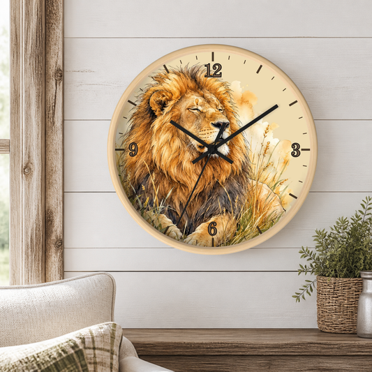 A round wall clock with a natural wood frame and a printed lion illustration on the face, mounted on a shiplap wall above a wooden shelf with a potted plant