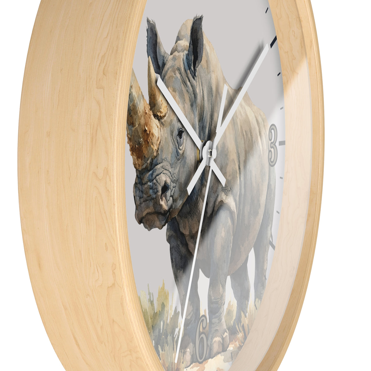 A round wall clock with a light natural wood frame and a printed rhinoceros illustration on the face, shown against a plain white background.