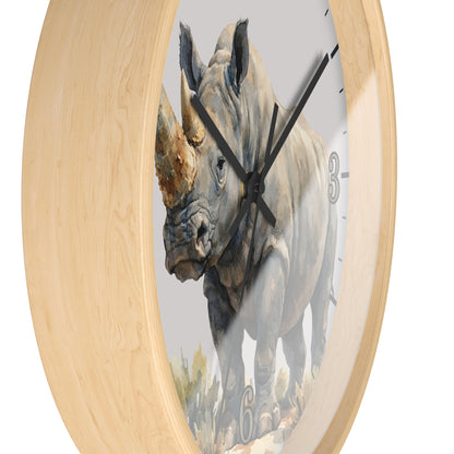 Round wall clock with a light natural wood frame and a printed rhinoceros illustration on the face, with black hands and partial gray numerals visible.