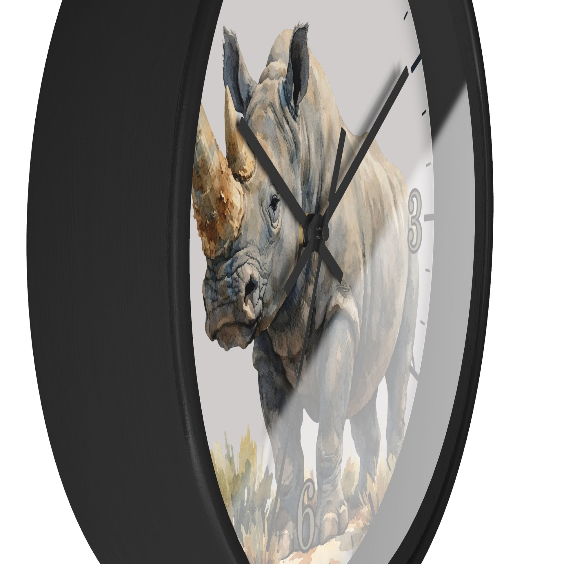 side close up of a black framed wood clock with a watercolor illustration of a Rhinoceros in tall safari grass on a white  background.