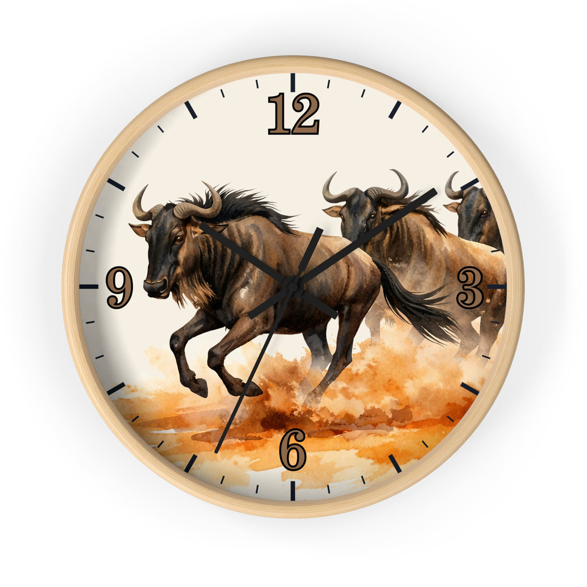 Round wall clock with a light wood frame and a printed design of three wildebeest running across an orange and cream landscape. The clock face has black hour markers and black hands.