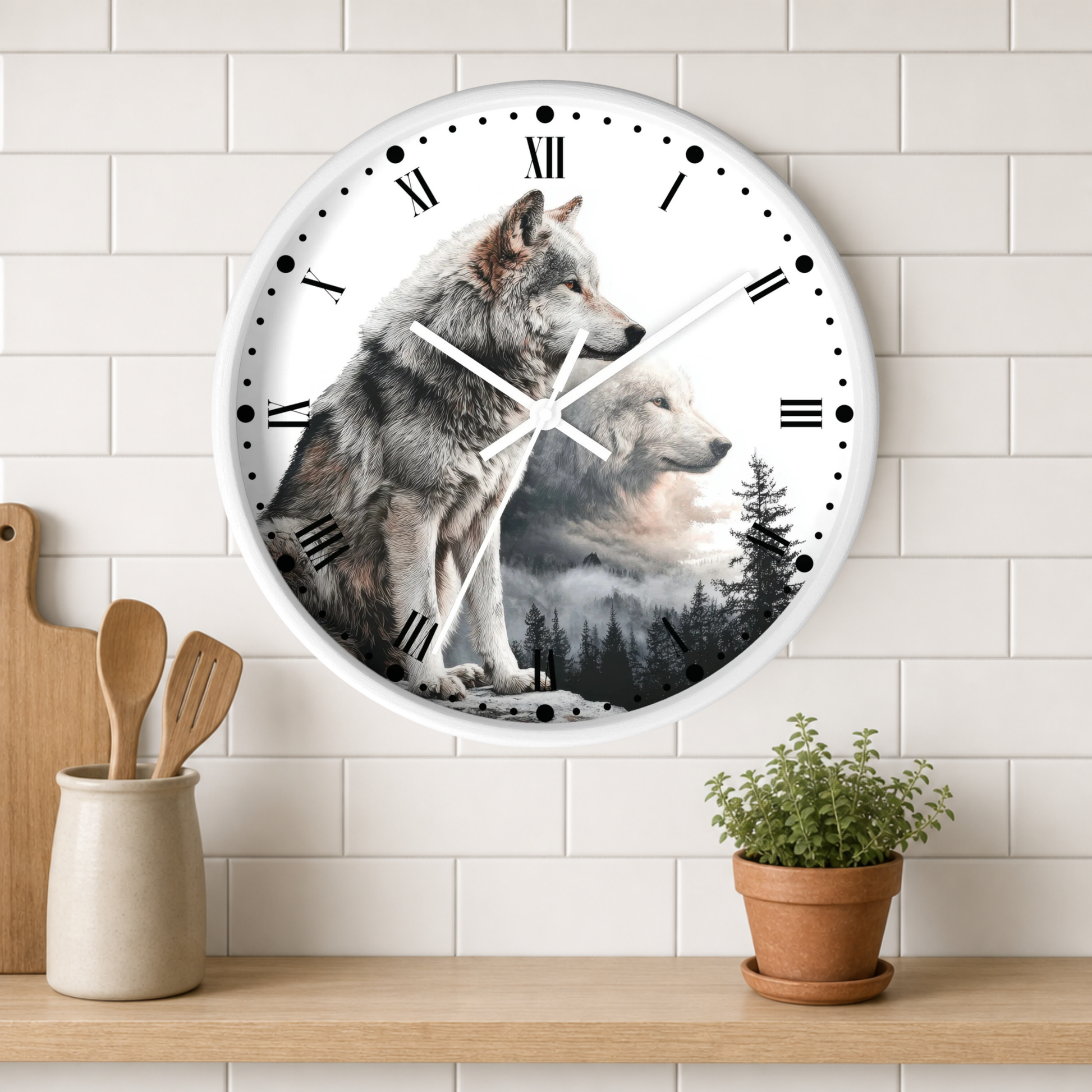 A round wall clock with a white frame and Roman numerals, featuring a printed design of two wolves in a snowy forest. The clock is mounted on a white subway tile wall above a wooden shelf with kitchen utensils and a small potted plant.