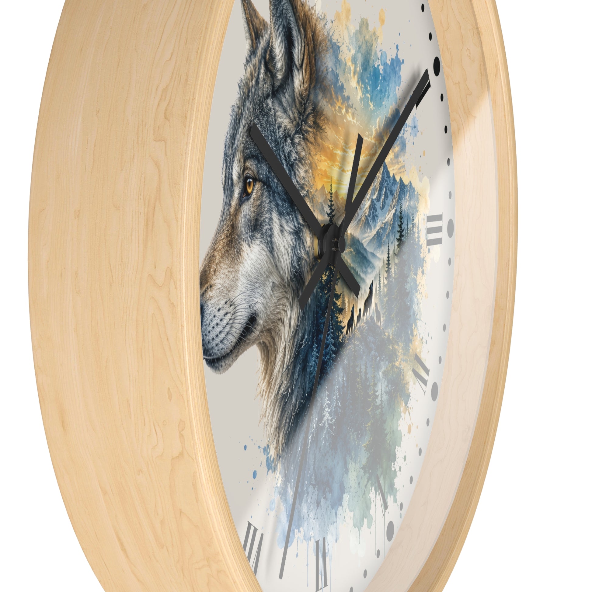 Round wall clock with a light natural wood frame and a printed wolf illustration over a watercolor-style mountain and tree scene on the dial.