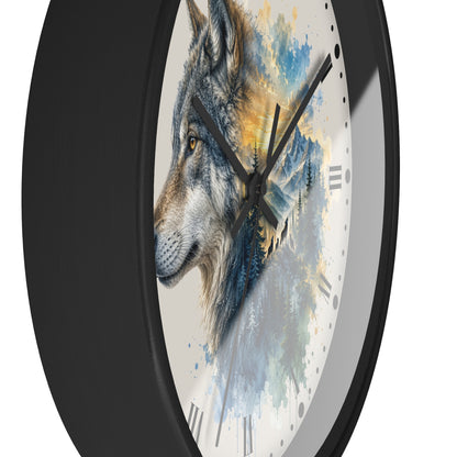 A round wall clock with a black frame and a white dial featuring a painted wolf head over blue, gray, and yellow watercolor-style scenery. The clock is shown at an angle against a plain white background.