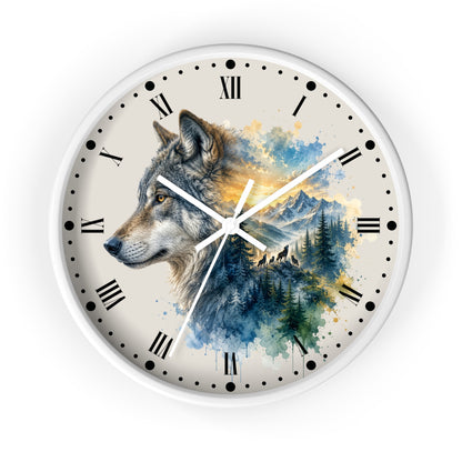 A round wall clock with a white frame and a printed dial featuring a wolf in profile over a watercolor landscape of mountains, trees, and blue sky. The clock has black Roman numerals and black hour markers with dot details, and white hands.